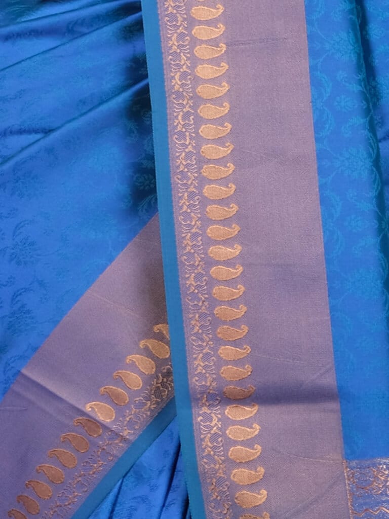 Blue Gold Toned Woven Design Banarsee Party Wear Semi Silk Saree - Close Up Pose